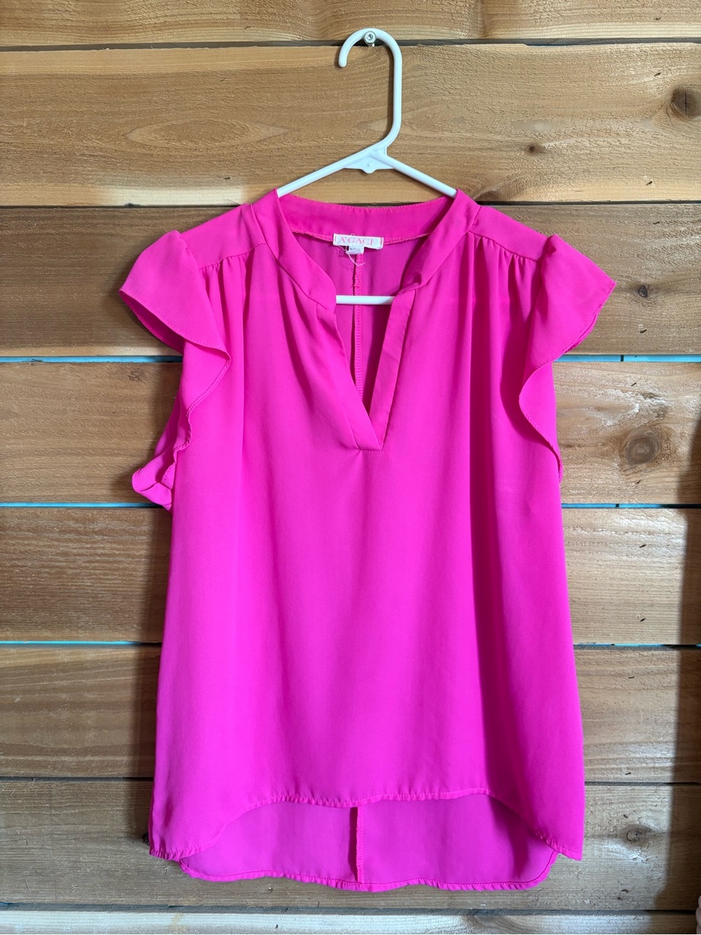 A'Gaci pink blouse with ruffle sleeves and V-neckline. Size M